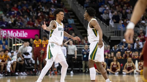 Baylor Bears teammates Jalen Bridges and Adam Flagler celebrate a play.
